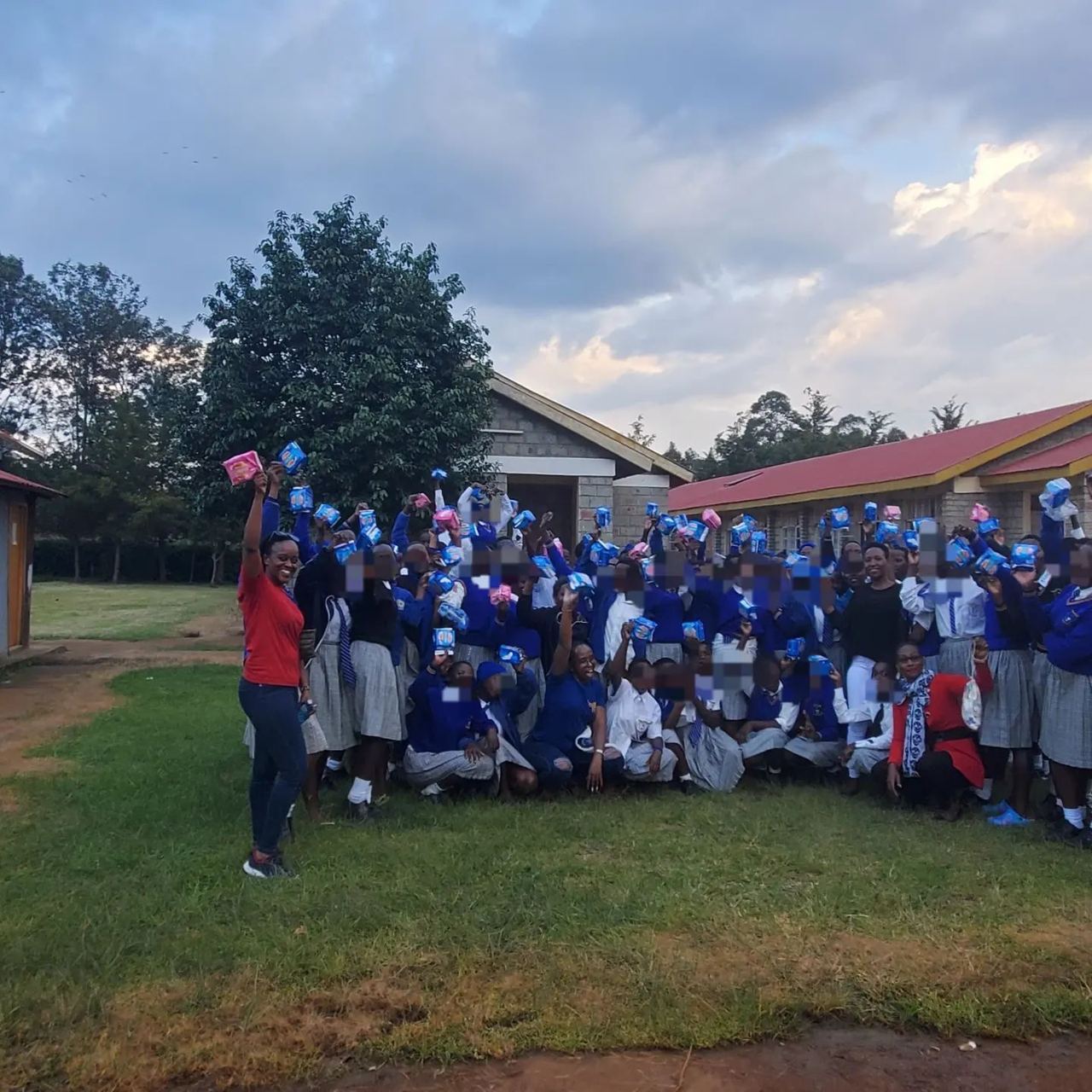 Distributing pads to girls